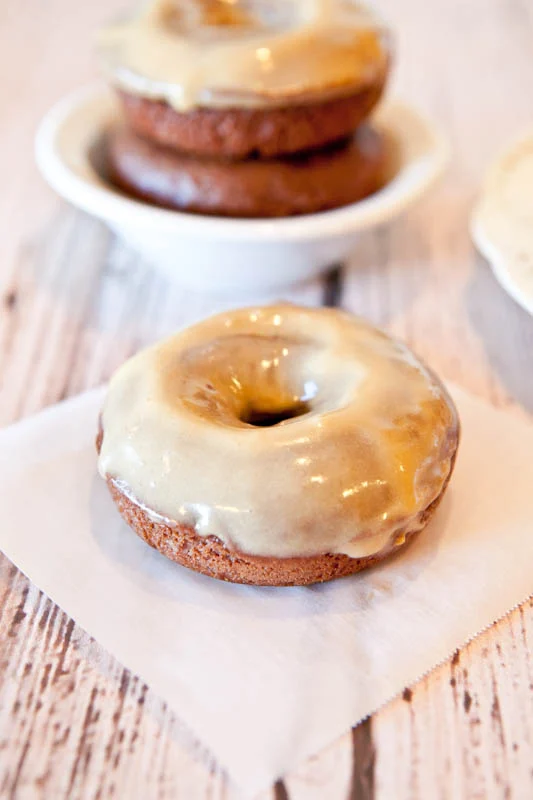 Vanilla protein-loaded healthy baked doughnuts with peanut butter glaze